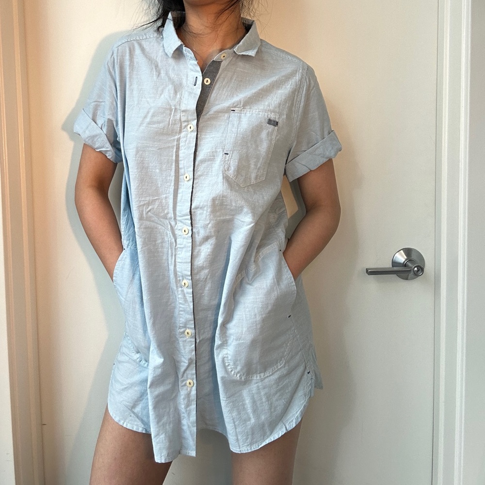 Blue button down short sleeve shirt with pocket size L